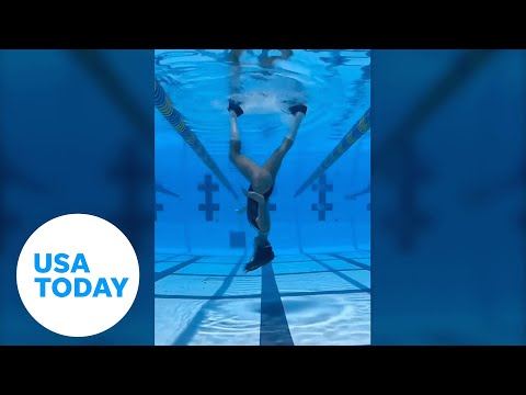 Dancer from Miami, Florida, does moonwalk dance underwater | USA TODAY