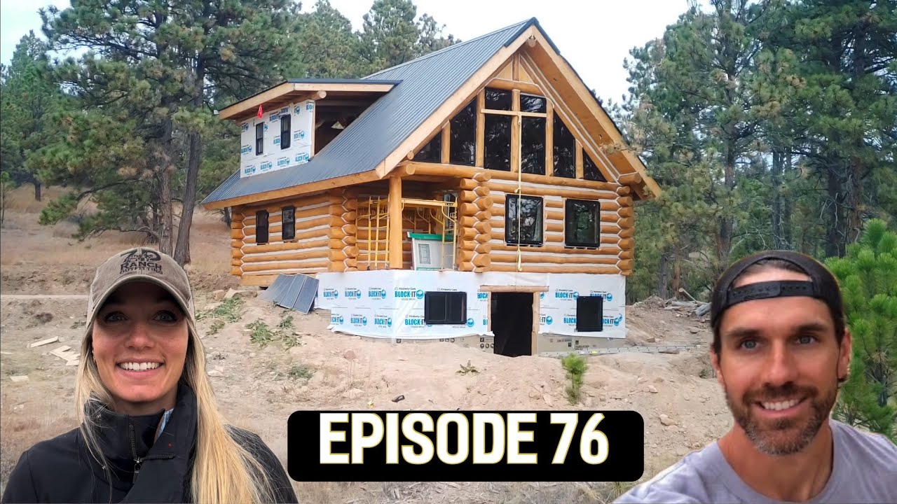 Two years building our own Off Grid Log Cabin- Getting dried in before ...