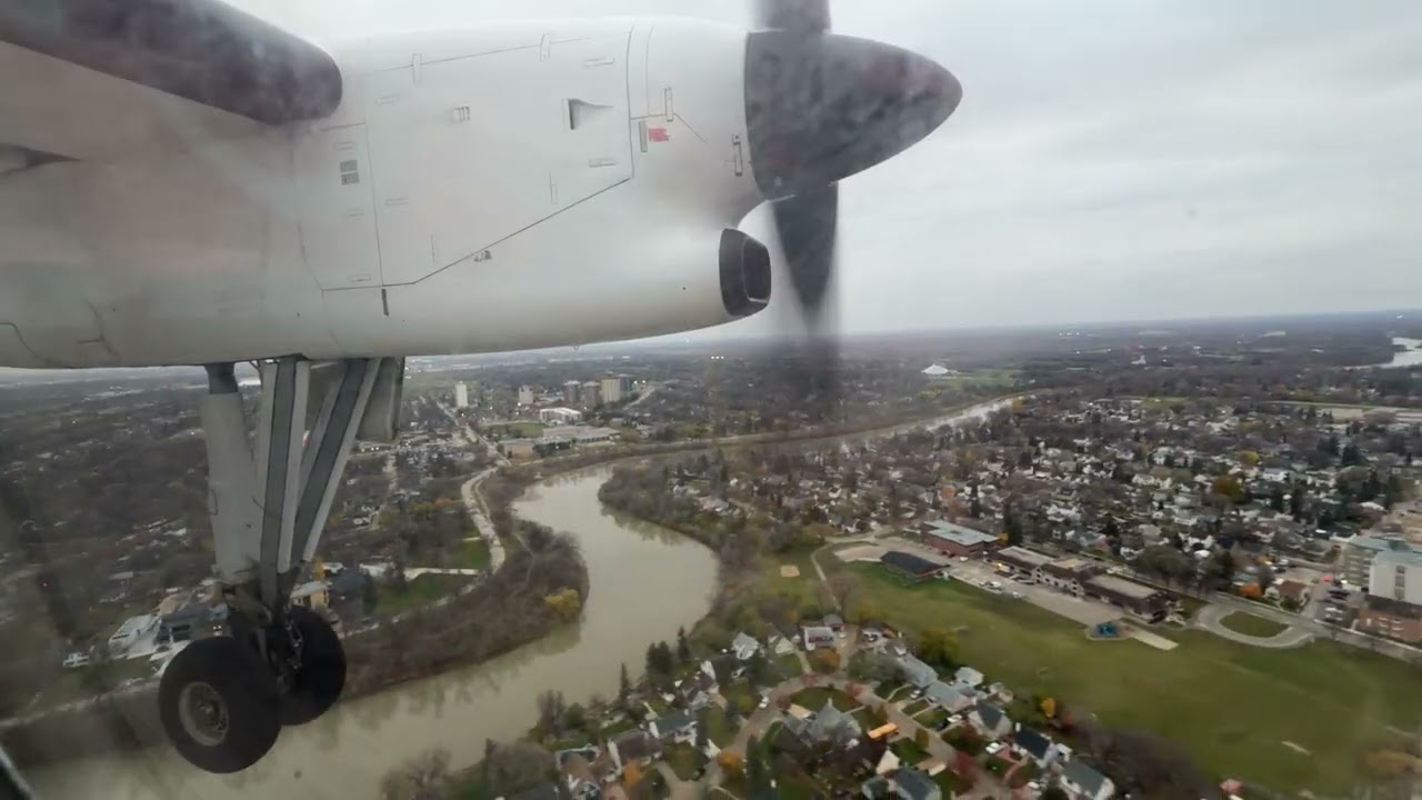 Perimeter Dash 8 approach and landing on Runway 31 at Winnipeg 