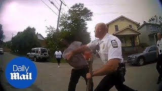 Bodycam video shows police officer PUNCHING man in face