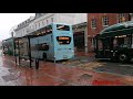 London Double-Decker Colored buses on a Rainy Day / Architecture