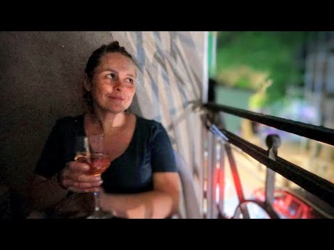 A serious conversation on the balcony