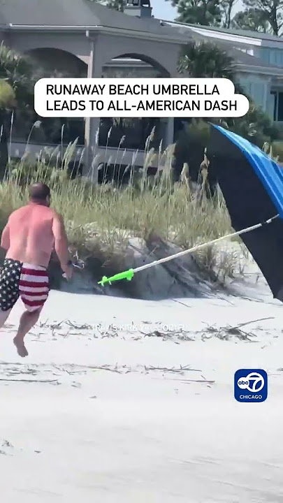 Runaway beach umbrella leads to all-American dash