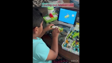 Reyaan new toy- Makerzoid  .. loving building toy
