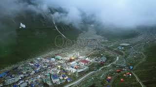 Kedarnath, India: Hindu Temple and pilgrimage aerial shot in clouds | Stock Video