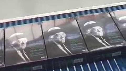 Kallfass High Speed Automatic Shrink Wrap Machine Shrink Wrapping DVDs in Boxes