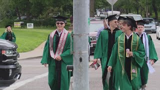 WashU commencement faces protests; some grads walk out during chancellor's speech, others applaud