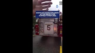 Bodycam shows explosion as car drives over downed power lines