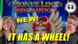 BRAND NEW MONEY LINK REVOLUTION - AMAZON FORTUNE! IT HAS TWO SETS OF REELS AND A WHEEL!