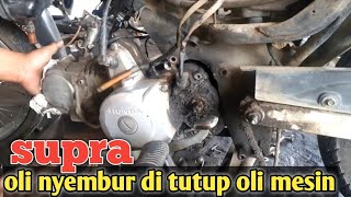 lubang pernafasan supra mampet,sehingga oli nyembur di tutup olinya