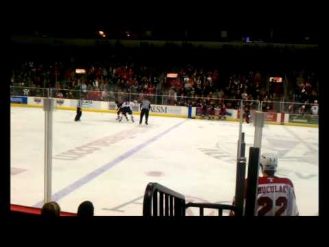 Kip Brennan of the Allen Americans Fights Garrett ...