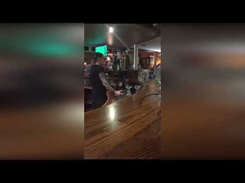 Shocking video shows barmaid allegedly topping off pint of Guinness with dregs of previous drink