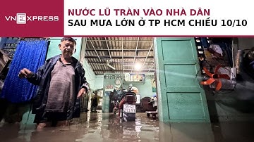 Nước tràn vào nhà dân sau mưa lớn ở TP HCM | VnExpress