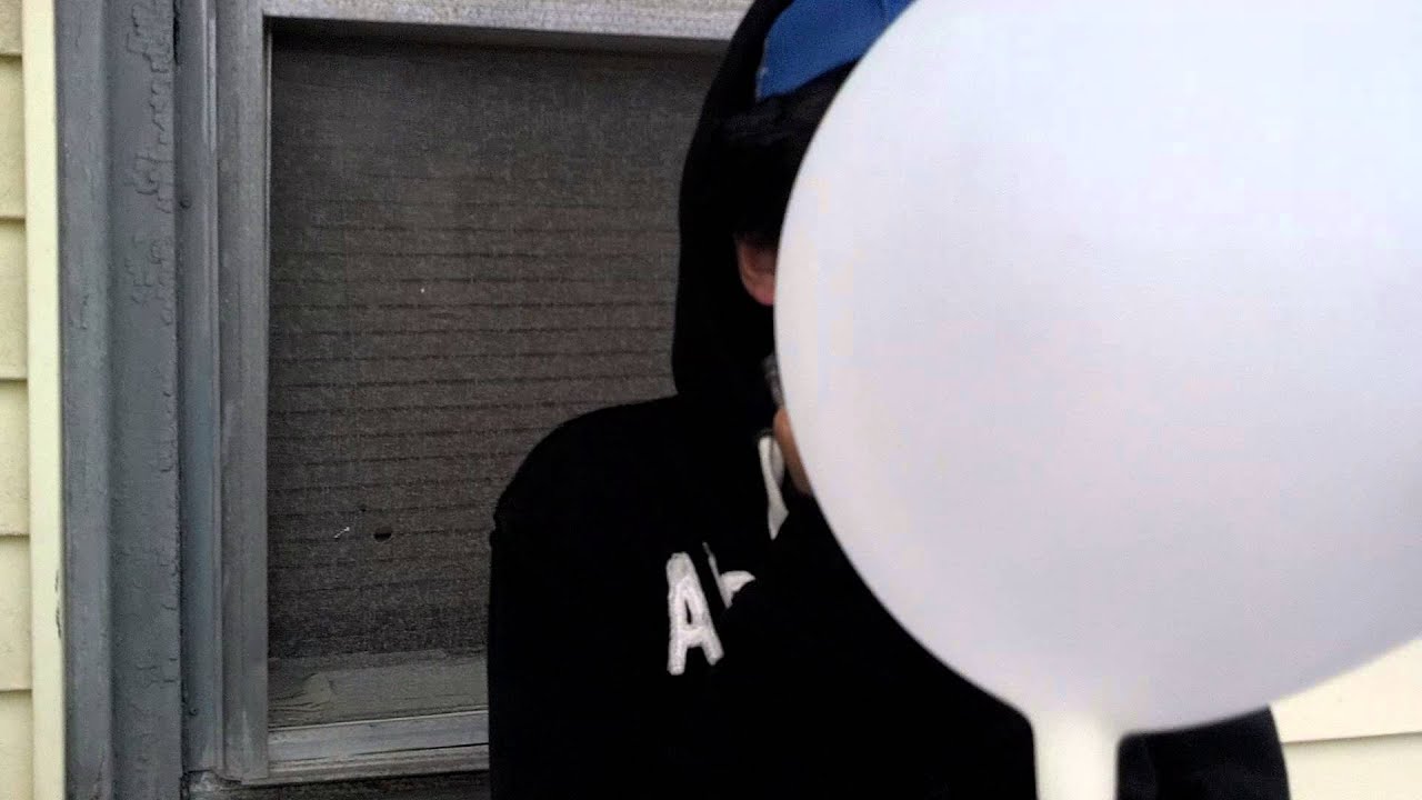 Rubber glove blowing with nose