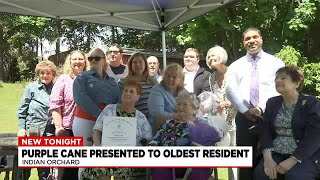 Local leaders award ‘Purple Cane’ to a 99-year-old resident