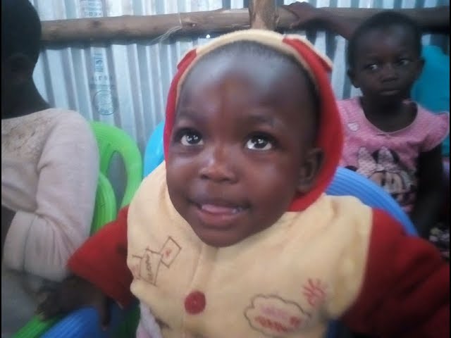 Brother Enos Leading Worship WFF/GMFC Kibera Slum Kenya