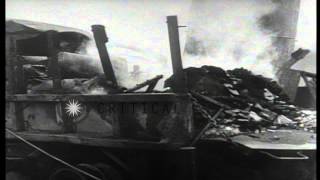 US troops hose down deck of USS LST-340 after being attacked by Japanese bombers ...HD Stock Footage