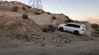 Lx 570 crawling up the hill Crawl control set at low speed .