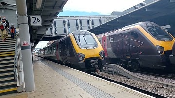 Class 220 and a 221 departing Derby