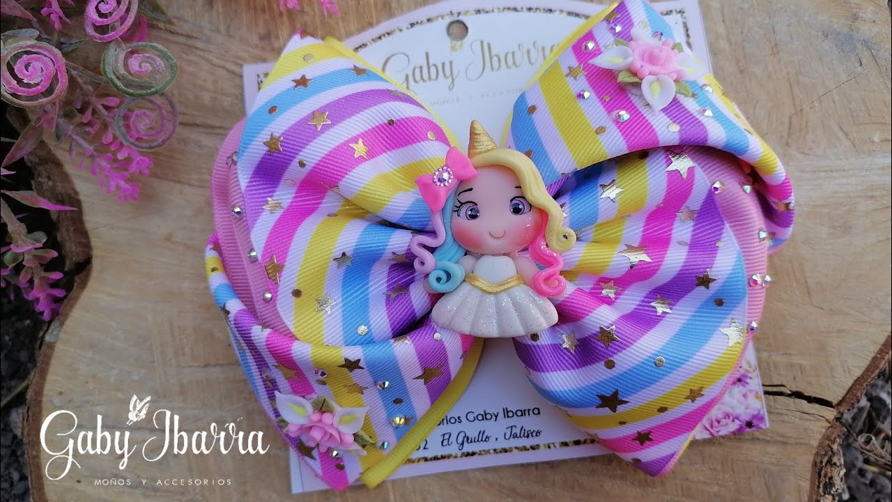 MOÑO GUTTA CON OLAN