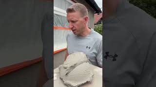 Applying the 1st coat of render