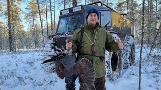 Тайга и охота зимой на вездеходе Тайфун. Typhoon all-terrain vehicle hunting in the Russian forest.