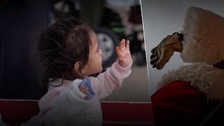 Trading Rudolph for rope: Santa rappels down Children's Hospital Colorado to spread holiday cheer