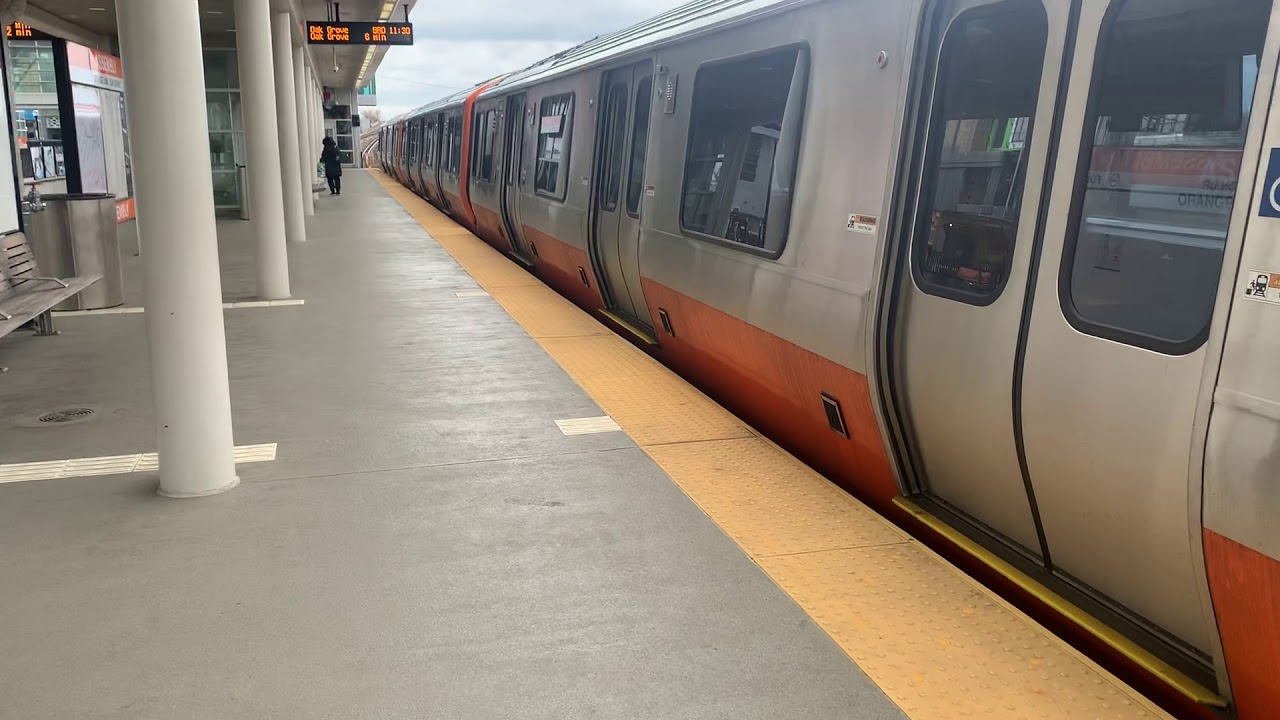 MBTA 1402-1410  Orang Line departing Assembly Station