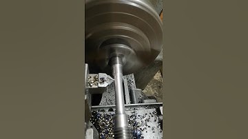 THREADED ROUND TENSILE SAMPLE BEING MACHINED TO SIZE ON UNIVERSAL PARALLEL LATH