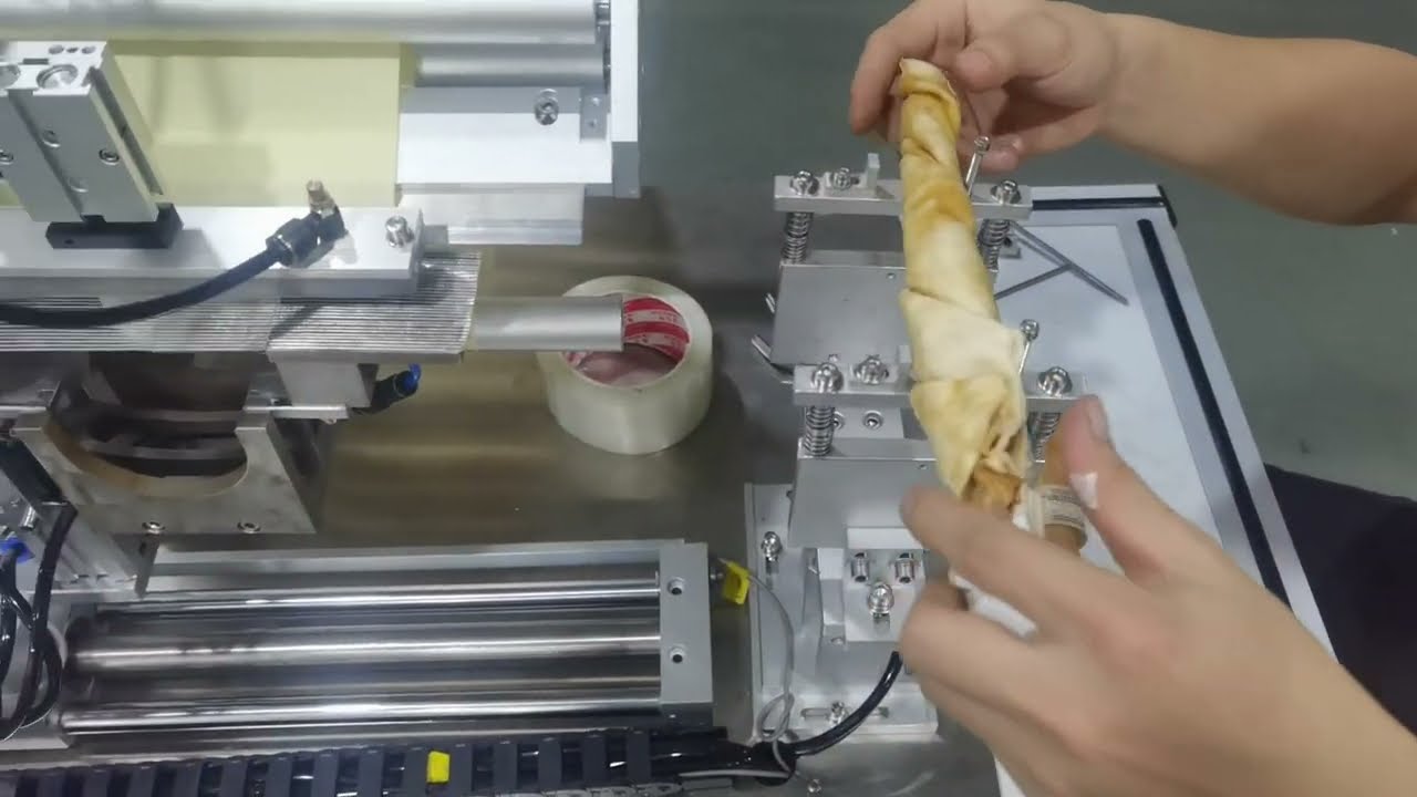 semi automatic dog chew sticker labeling machine folding labeller tested for Poland customer