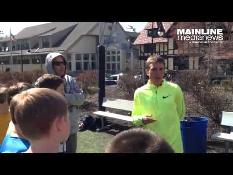 Zach Miller talks to the Rosemont School track team