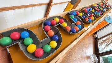 Marble run course using pipe ramps, a large wooden funnel, and a rain gutter #ASMR