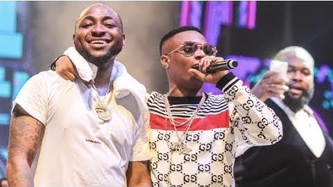 Davido and Wizkid hug each other at nightclub in Lagos