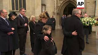 Mourners follow Hawking coffin out of church after funeral service