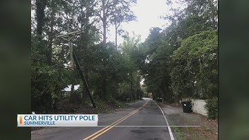 Car hits utility pole