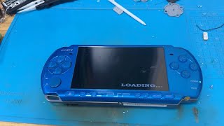 Trying to stop a squeeky UMD drive on a Sony PSP - Let's Repair It