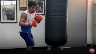 Watch Manny Pacquiao kill the heavy bag with 10 punch combos ahead of Mayweather fight