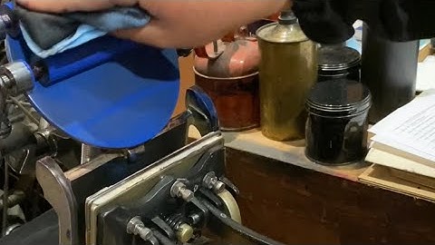 Cleaning a 3x5 Kelsey Excelsior tabletop printing press with 1K kerosene after printing in blue ink