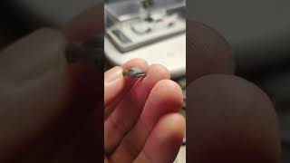 Tiny Gray Model Car Body in Macro