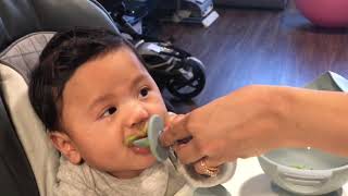 Baby eating Peas for the FIRST time!