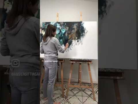 Watch an artist creating an abstract floral painting.