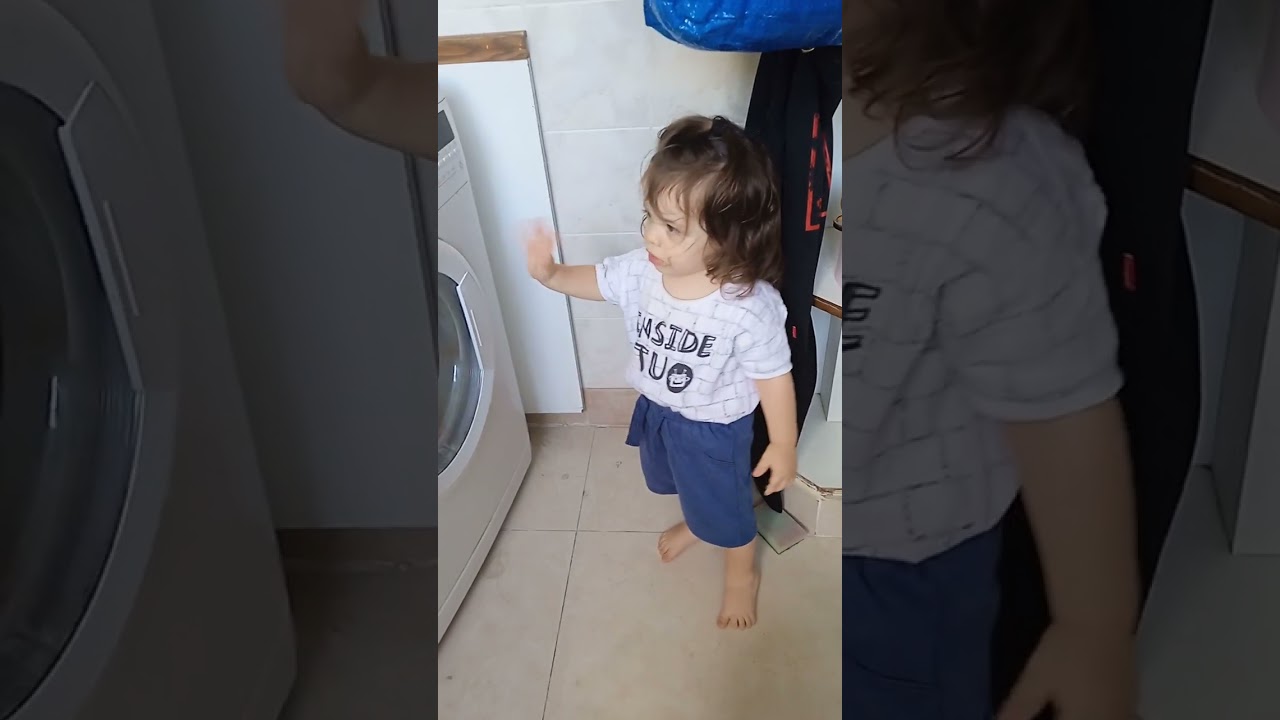 David helps Mommy with the laundry