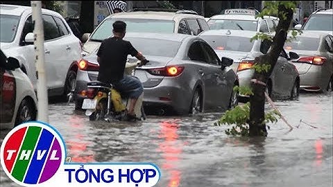 THVL | Nhiều tuyến đường ở TP. HCM ngập cục bộ sau mưa lớn