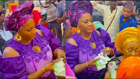 Watch How Doyin Kukoyi Rains Special Money On Her Mother At Her 70th Birthday Party