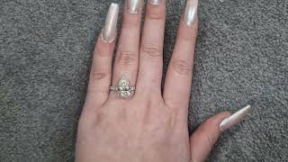 GIA 5.02ct L/SI1 Pear Cut Diamond Solitaire set in Platinum with Diamond Shoulders GIA 5.02ct L/SI1 Pear Cut Diamond Solitaire set in Platinum with Diamond Shoulders
