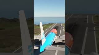 KLM 777-300ER  with orange livrey  takeoff from  saba island with short runway