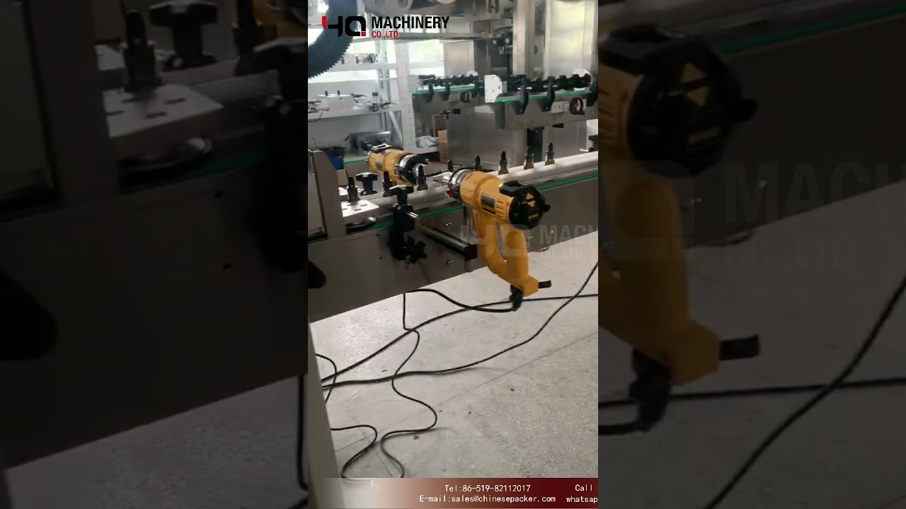 auto shrink band applicator for essential oil bottle|YQ machinery tamper evident band applicator