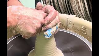 Wheel throwing a wine goblet stem Wealth