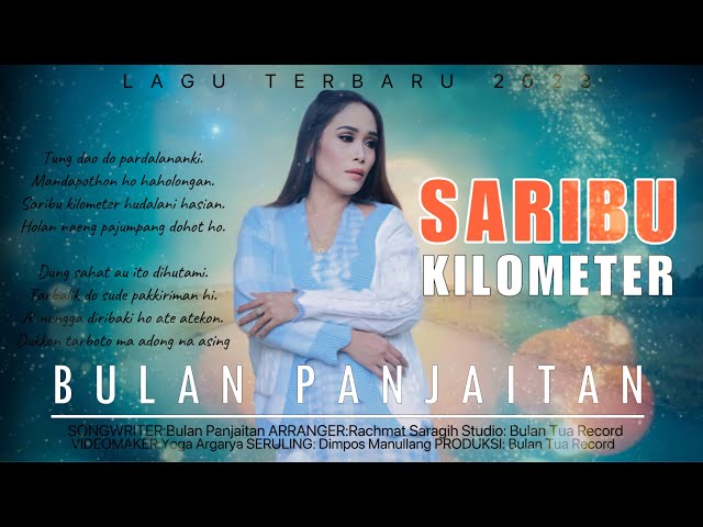 Saribu Kilometer-Bulan Panjaitan (Official Music Video) class=