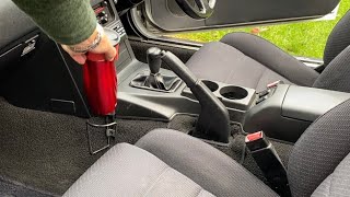 Innovative and clever cup holder option for 1990-1997 Mazda MX-5 Miata / Eunos.